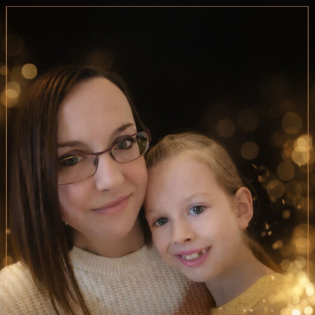 Mother and daughter portrait against a black and gold background, natural skin tones, elegant and timeless family photography