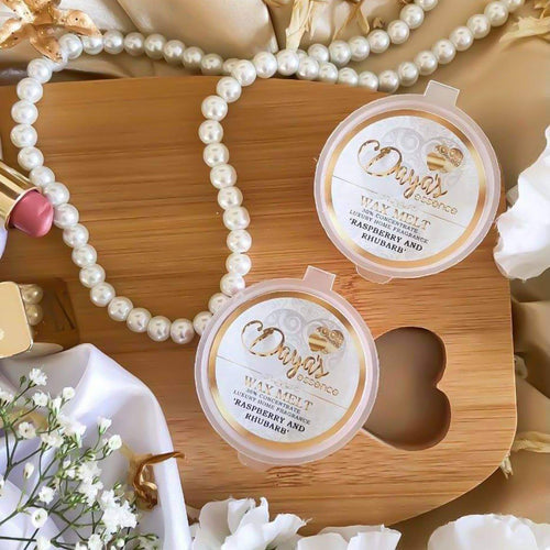 Daya's Essence "Raspberry and Rhubarb" melts with pearls; blog on soy vs. paraffin wax.